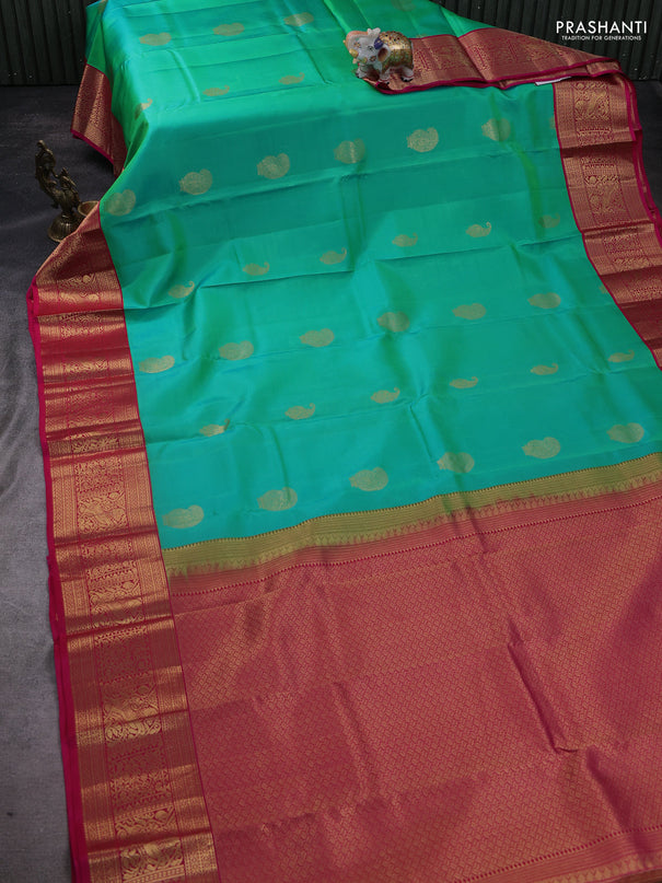 Pure kanchipuram silk saree teal green and pink with paisley zari woven buttas and zari woven korvai border