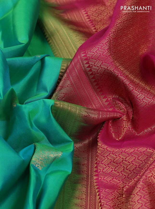 Pure kanchipuram silk saree teal green and pink with paisley zari woven buttas and zari woven korvai border