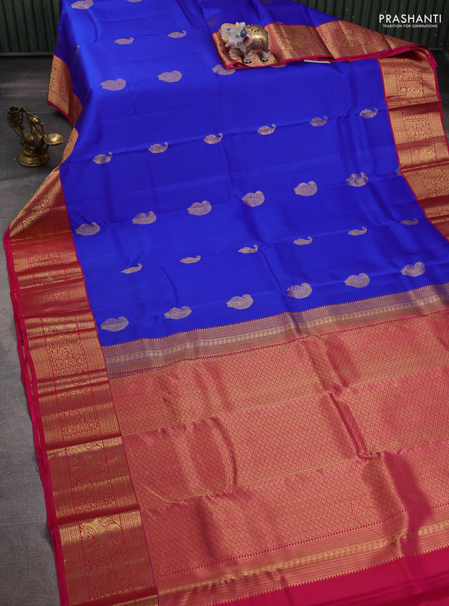 Pure kanchipuram silk saree royal blue and pink with paisley zari woven buttas and zari woven korvai border