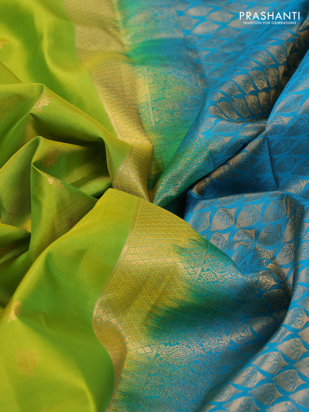 Pure kanchipuram silk saree lime green and teal blue shade with allover zari woven buttas and rettapet zari woven korvai border