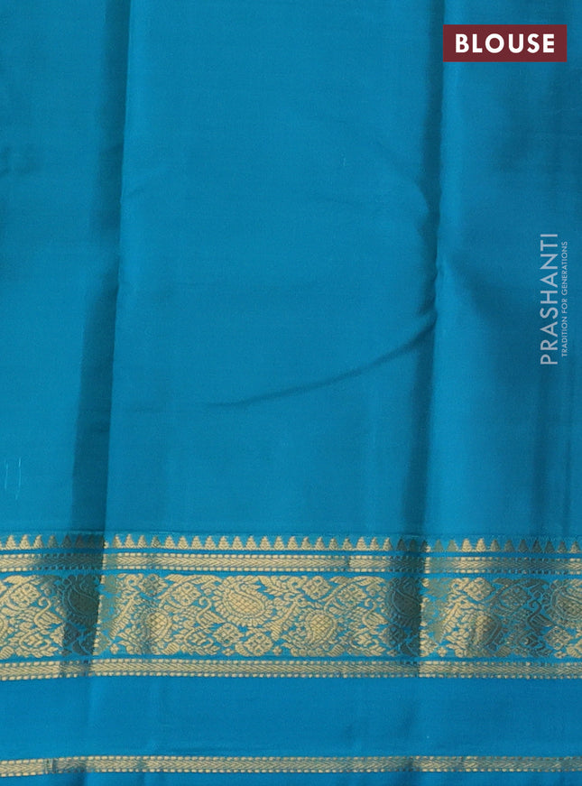 Pure kanchipuram silk saree lime green and teal blue shade with allover zari woven buttas and rettapet zari woven korvai border