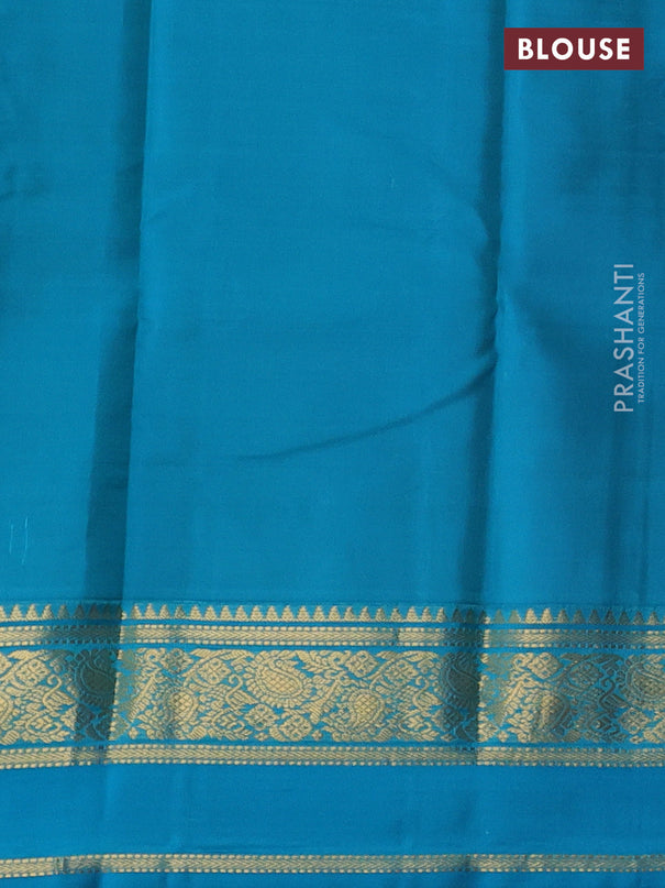 Pure kanchipuram silk saree lime green and teal blue shade with allover zari woven buttas and rettapet zari woven korvai border