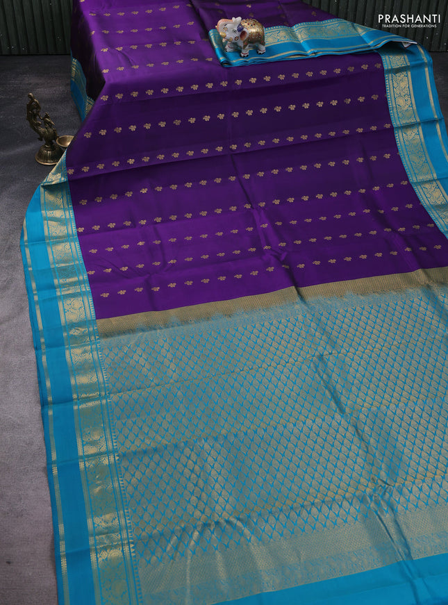 Pure kanchipuram silk saree violet and teal blue shade with allover zari woven buttas and rettapet zari woven korvai border