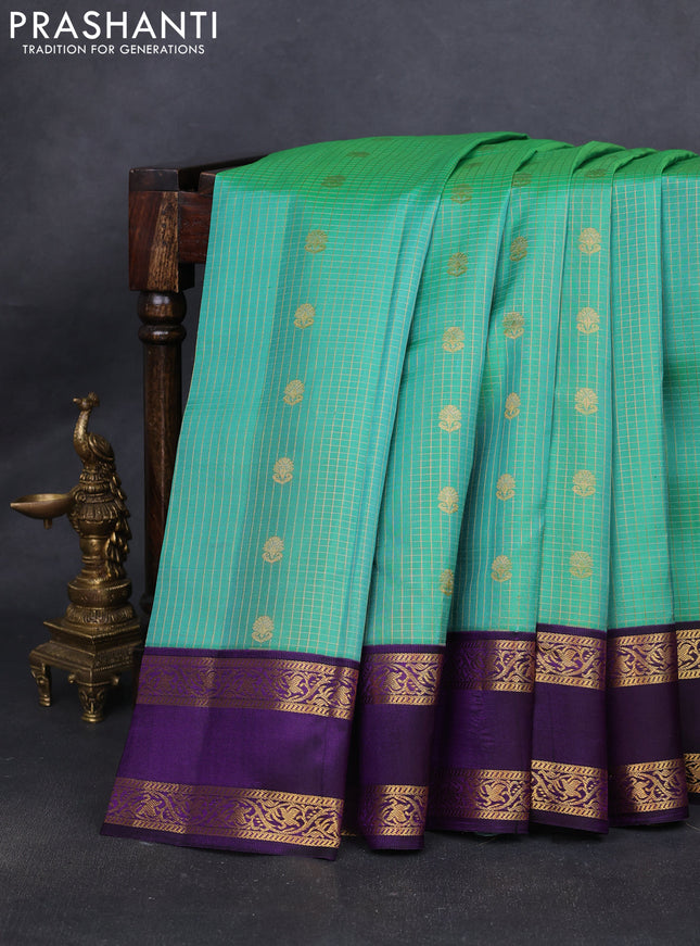 Pure kanchipuram silk saree teal green shade and violet with allover zari checks & buttas and rettapet zari woven korvai border