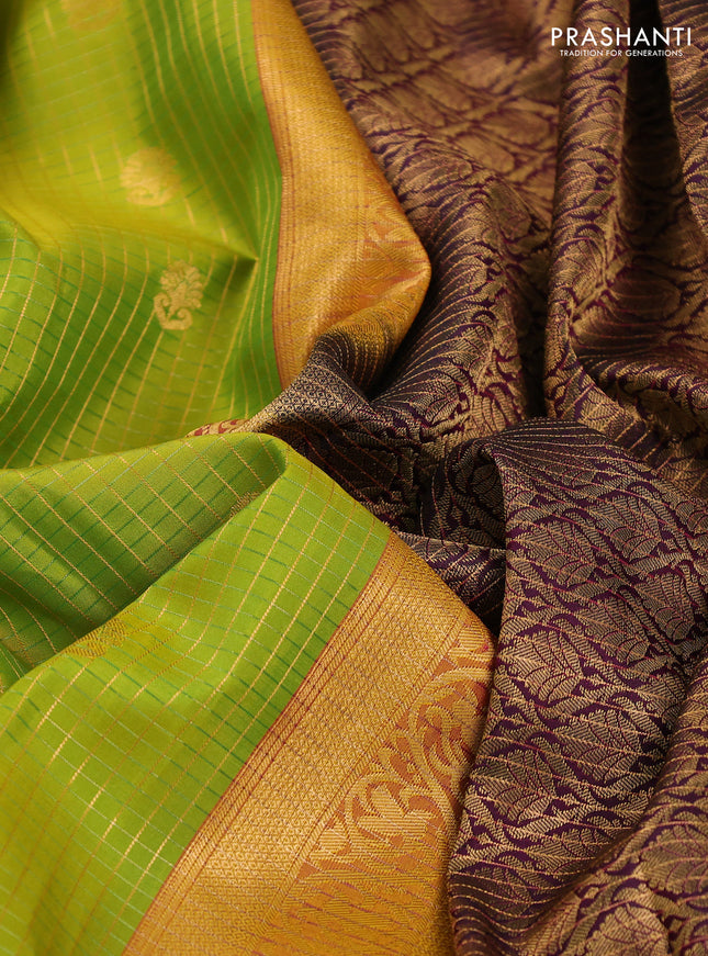 Pure kanchipuram silk saree dual shade of lime green and wine shade with allover zari checks & buttas and rettapet zari woven korvai border