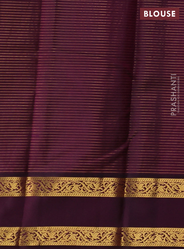 Pure kanchipuram silk saree dual shade of lime green and wine shade with allover zari checks & buttas and rettapet zari woven korvai border