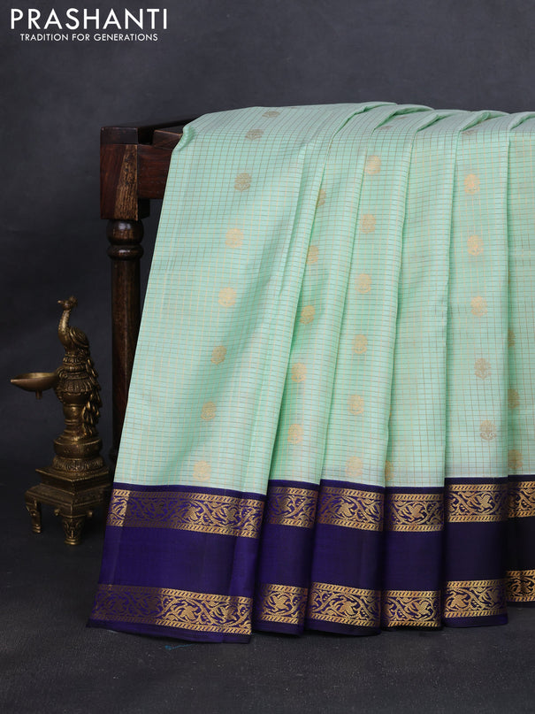 Pure kanchipuram silk saree pista green and blue with allover zari checks & buttas and rettapet zari woven korvai border