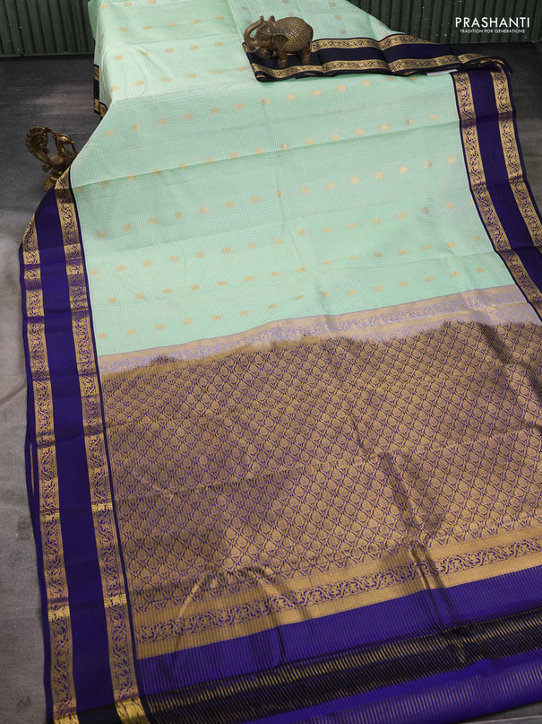 Pure kanchipuram silk saree pista green and blue with allover zari checks & buttas and rettapet zari woven korvai border