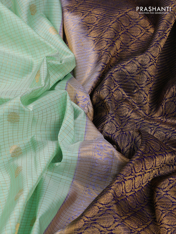 Pure kanchipuram silk saree pista green and blue with allover zari checks & buttas and rettapet zari woven korvai border