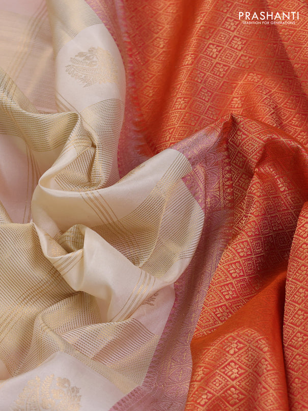 Pure kanchipuram silk saree cream and orange with allover zari checks & buttas and rich zari woven korvai border