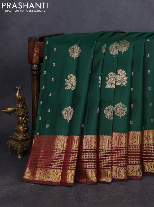 Pure kanchipuram silk saree dark green and maroon with zari woven buttas and long zari woven border