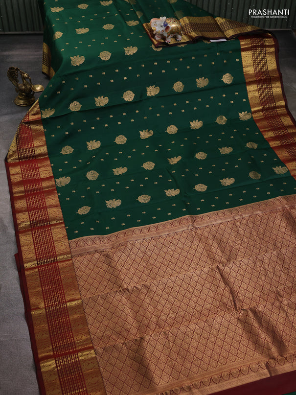 Pure kanchipuram silk saree dark green and maroon with zari woven buttas and long zari woven border