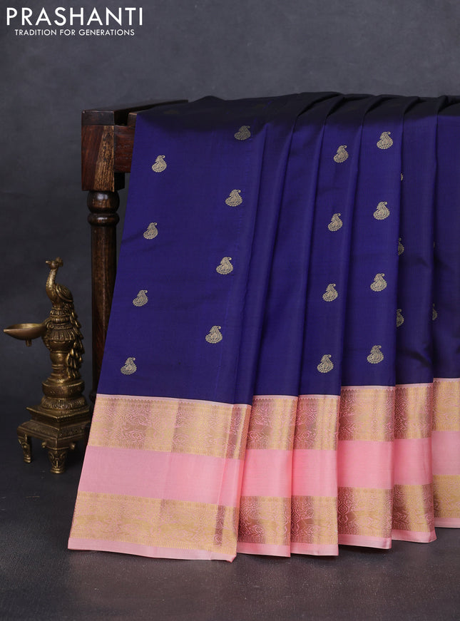 Pure kanchipuram silk saree navy blue and peach shade with zari woven buttas and long rettapet zari woven border