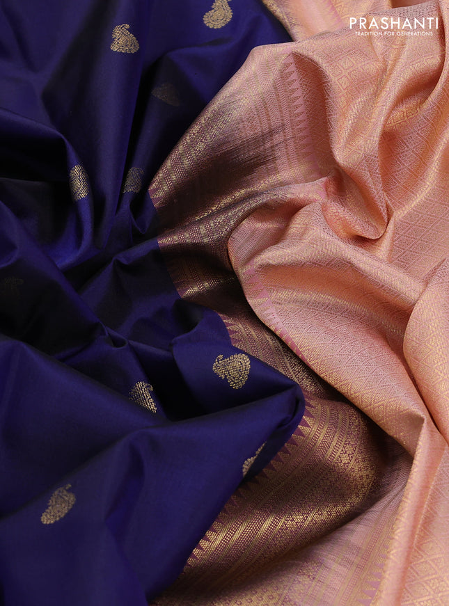 Pure kanchipuram silk saree navy blue and peach shade with zari woven buttas and long rettapet zari woven border