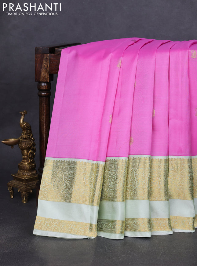 Pure kanchipuram silk saree lotus pink and mild pista green with zari woven buttas and long rettapet zari woven border