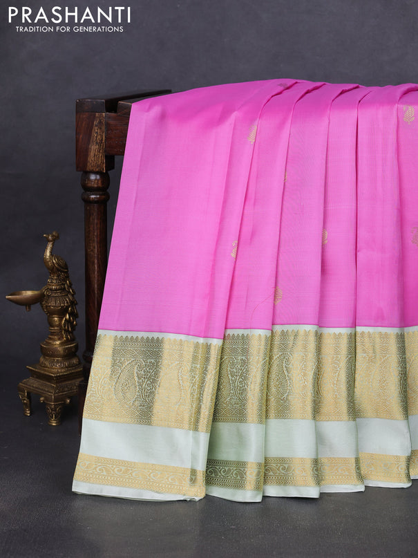 Pure kanchipuram silk saree lotus pink and mild pista green with zari woven buttas and long rettapet zari woven border