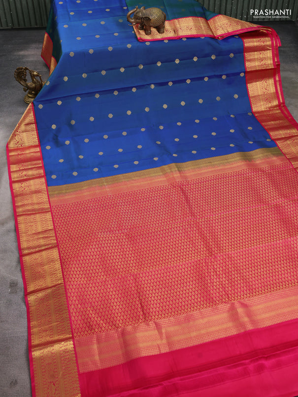 Pure kanchipuram silk saree dual shade of bluish green and pink with zari woven buttas and rich zari woven korvai border