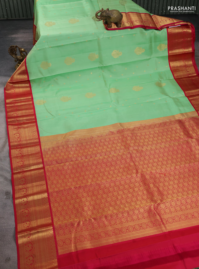 Pure kanchipuram silk saree pista green and reddish pink with zari woven buttas and rich zari woven korvai border