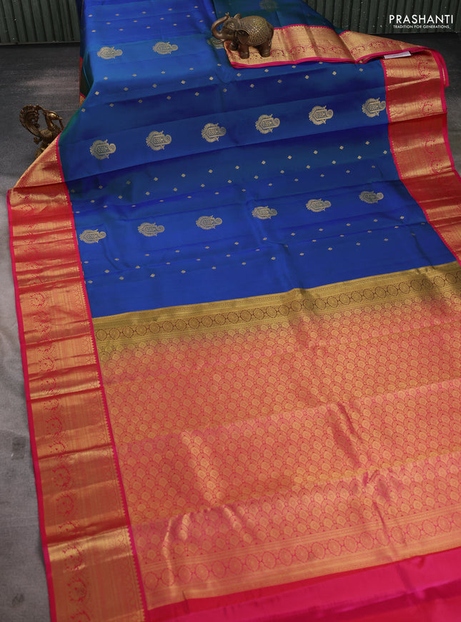 Pure kanchipuram silk saree dual shade of bluish green and pink with zari woven buttas and rich zari woven korvai border