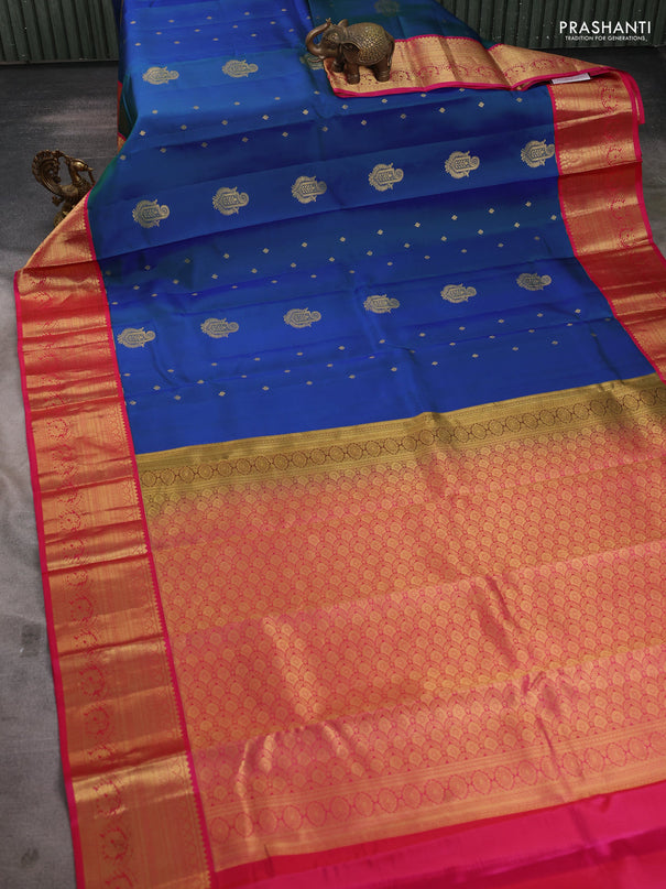 Pure kanchipuram silk saree dual shade of bluish green and pink with zari woven buttas and rich zari woven korvai border