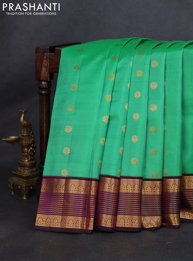 Pure kanchipuram silk saree teal green and purple with zari woven buttas and rich zari woven korvai border