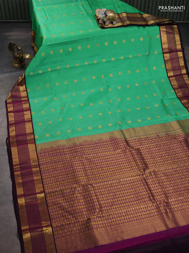 Pure kanchipuram silk saree teal green and purple with zari woven buttas and rich zari woven korvai border