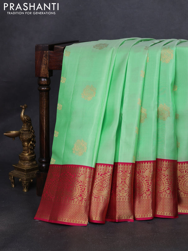 Pure kanchipuram silk saree pista green and pink with zari woven buttas and rich zari woven korvai border