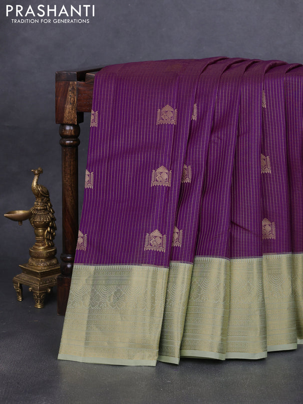 Pure kanchipuram silk saree purple and pista green with allover small zari checks & buttas and rich zari woven border