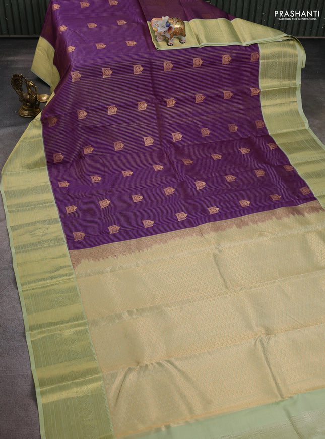 Pure kanchipuram silk saree purple and pista green with allover small zari checks & buttas and rich zari woven border