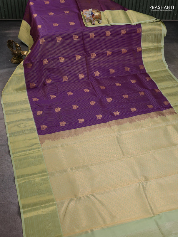 Pure kanchipuram silk saree purple and pista green with allover small zari checks & buttas and rich zari woven border