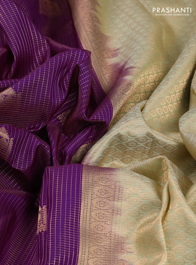 Pure kanchipuram silk saree purple and pista green with allover small zari checks & buttas and rich zari woven border