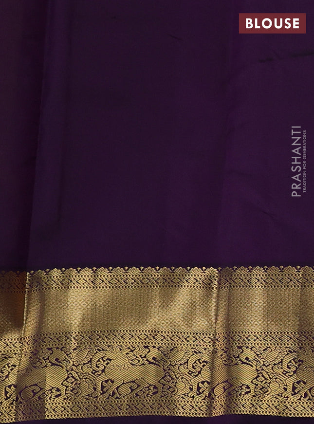 Pure kanchipuram silk saree yellow and deep purple with allover zari weaves & buttas and rich zari woven korvai border
