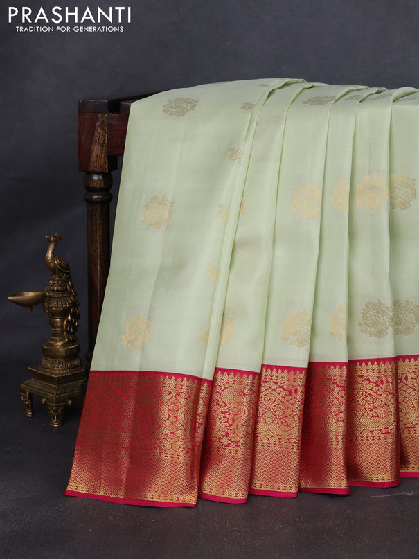 Pure kanchipuram silk saree mild pista green and pink with zari woven buttas and zari woven korvai border