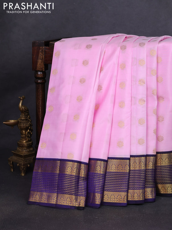 Pure kanchipuram silk saree light pink and navy blue with allover zari woven buttas and zari woven korvai border
