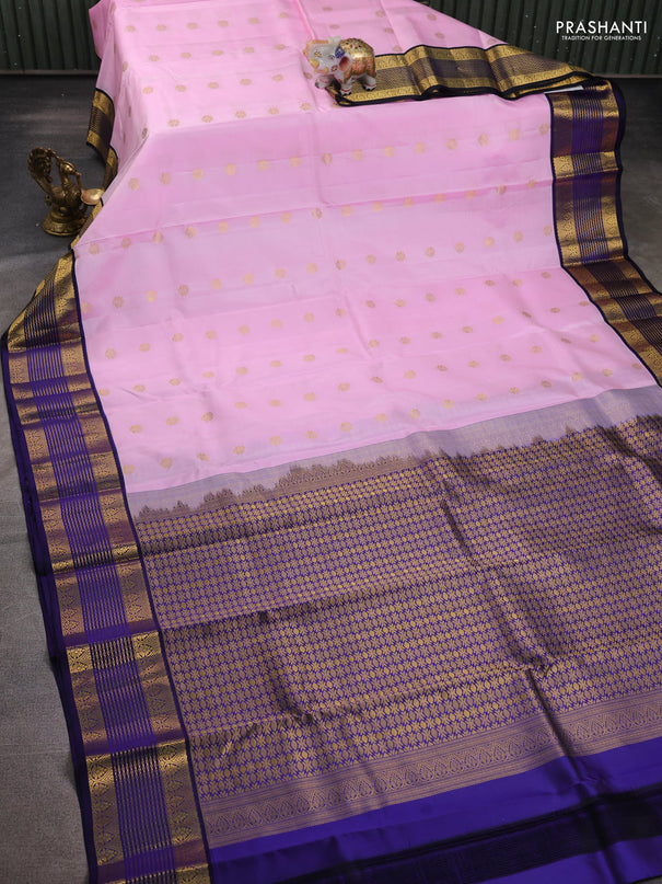 Pure kanchipuram silk saree light pink and navy blue with allover zari woven buttas and zari woven korvai border