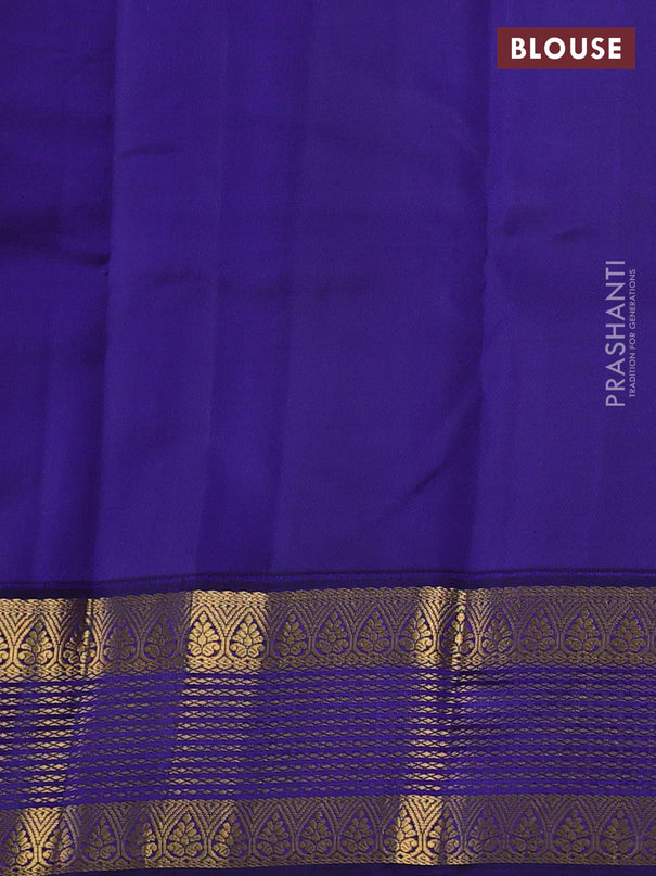 Pure kanchipuram silk saree light pink and navy blue with allover zari woven buttas and zari woven korvai border