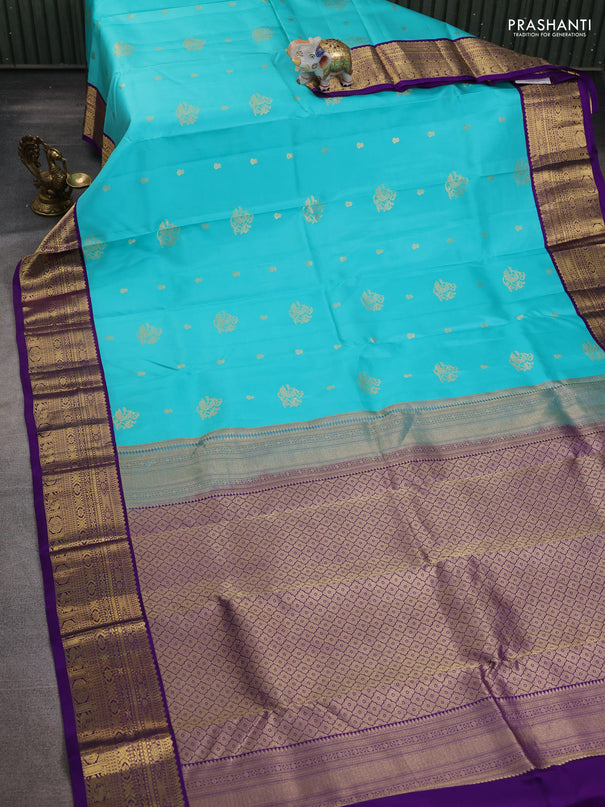 Pure kanchipuram silk saree teal blue and violet with zari woven buttas and zari woven korvai border