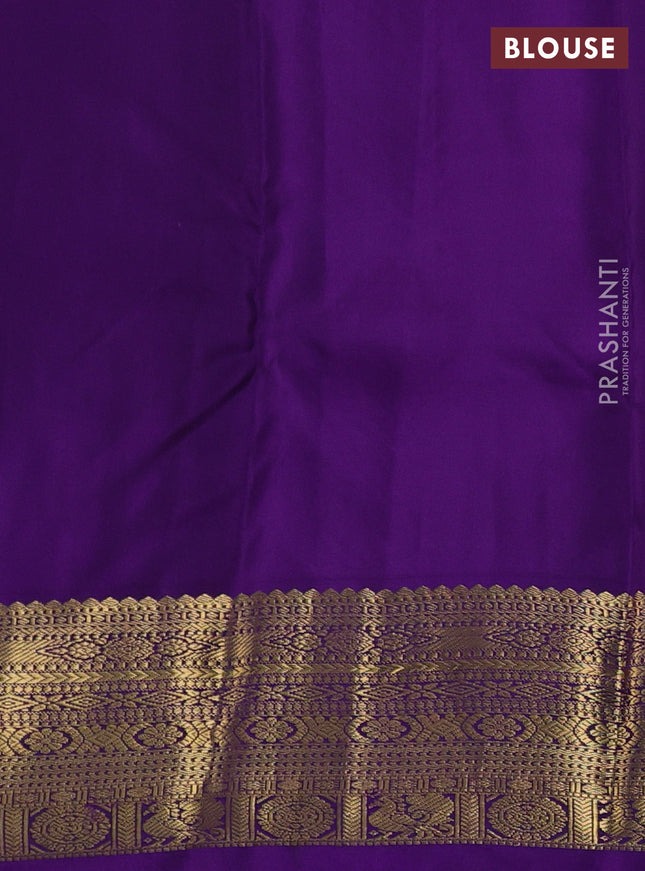 Pure kanchipuram silk saree teal blue and violet with zari woven buttas and zari woven korvai border