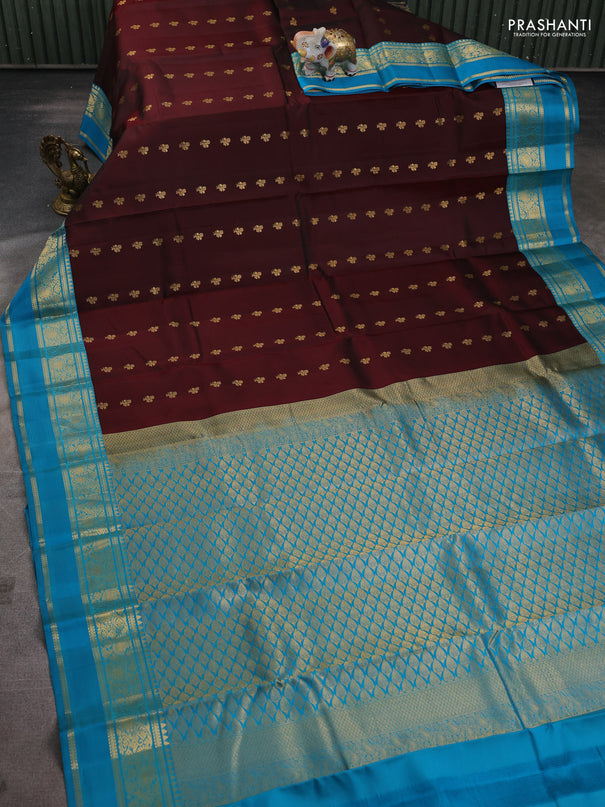 Pure kanchipuram silk saree deep maroon and blue with allover zari woven buttas and rettapet zari woven korvai border