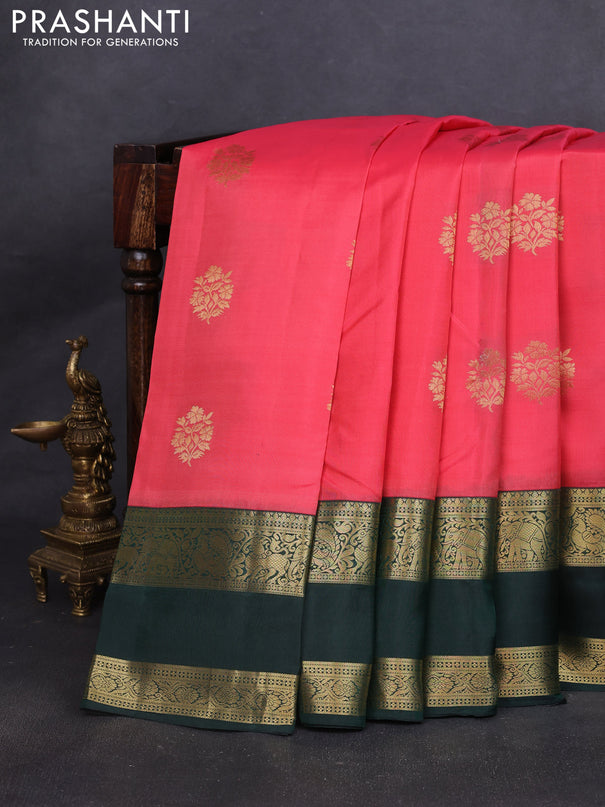 Pure kanchipuram silk saree peach shade and bottle green with zari woven buttas and long rettapet zari woven border