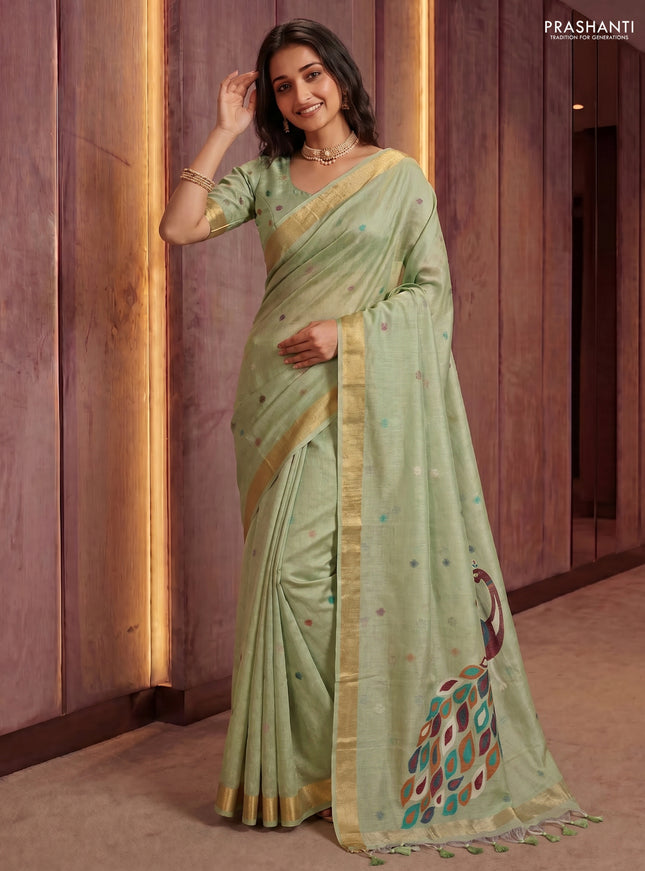 Linen cotton saree pista green with allover thread woven buttas and peacock pallu