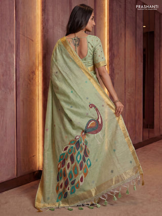 Linen cotton saree pista green with allover thread woven buttas and peacock pallu