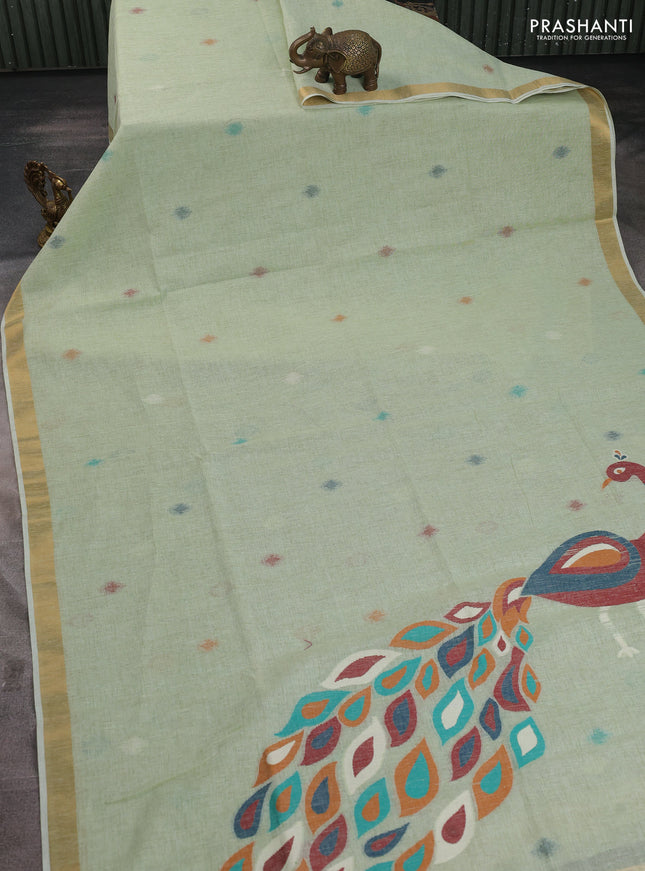 Linen cotton saree pista green with allover thread woven buttas and peacock pallu