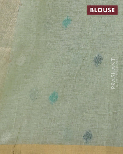 Linen cotton saree pista green with allover thread woven buttas and peacock pallu