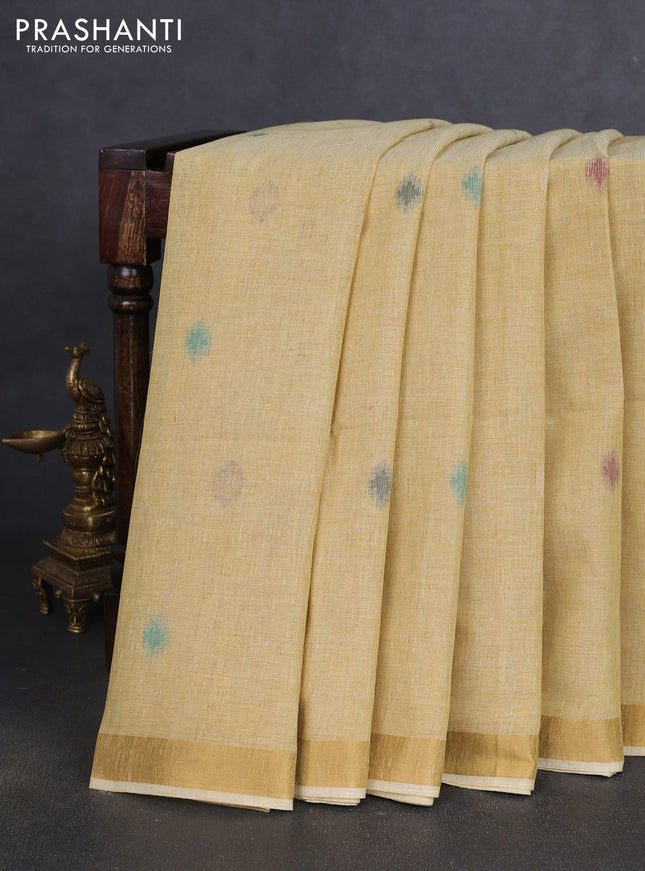 Linen cotton saree sandal with allover thread woven buttas and peacock pallu