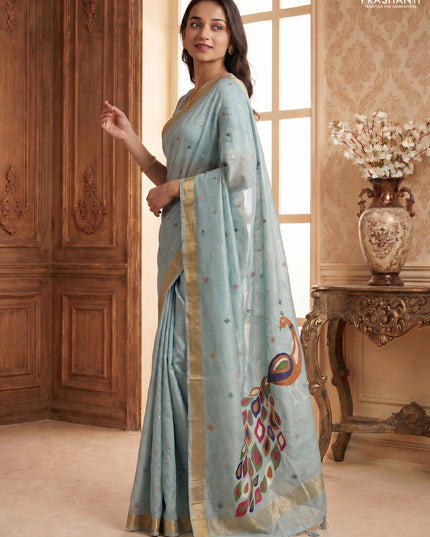 Linen cotton saree pastel blue with allover thread woven buttas and peacock pallu