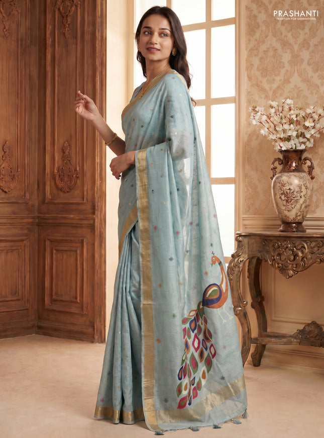 Linen cotton saree pastel blue with allover thread woven buttas and peacock pallu