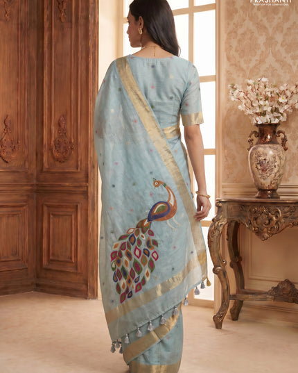 Linen cotton saree pastel blue with allover thread woven buttas and peacock pallu