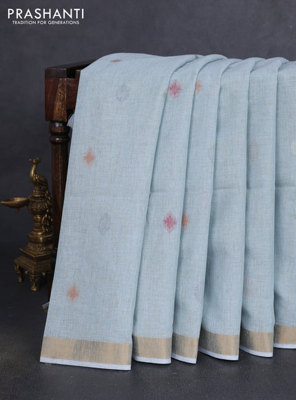 Linen cotton saree pastel blue with allover thread woven buttas and peacock pallu