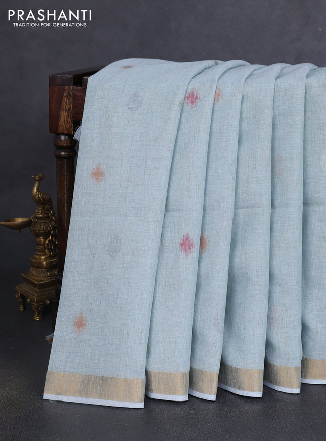 Linen cotton saree pastel blue with allover thread woven buttas and peacock pallu